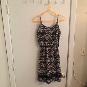 An Indulge, size S, black dress.